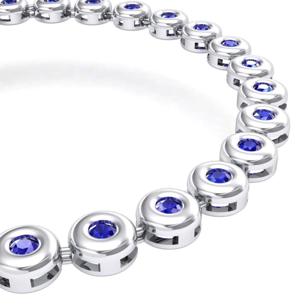 Tiny Bezel-Set Blue Sapphire Tennis Bracelet (1.62 CTW) 4127 Render 1 01 Camera2 Stone 3 Blue Sapphire 0 Floor 0 Metal 4 White Gold 0 Emitter Aqua Light 0