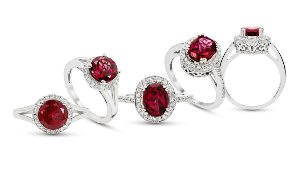 Red,ruby,ring,gemstone,with,diamond,jewelry,group,on,whit