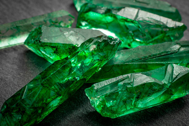 Closeup Of A Bunch Of Many Green Rough Uncut Emerald Crystals
